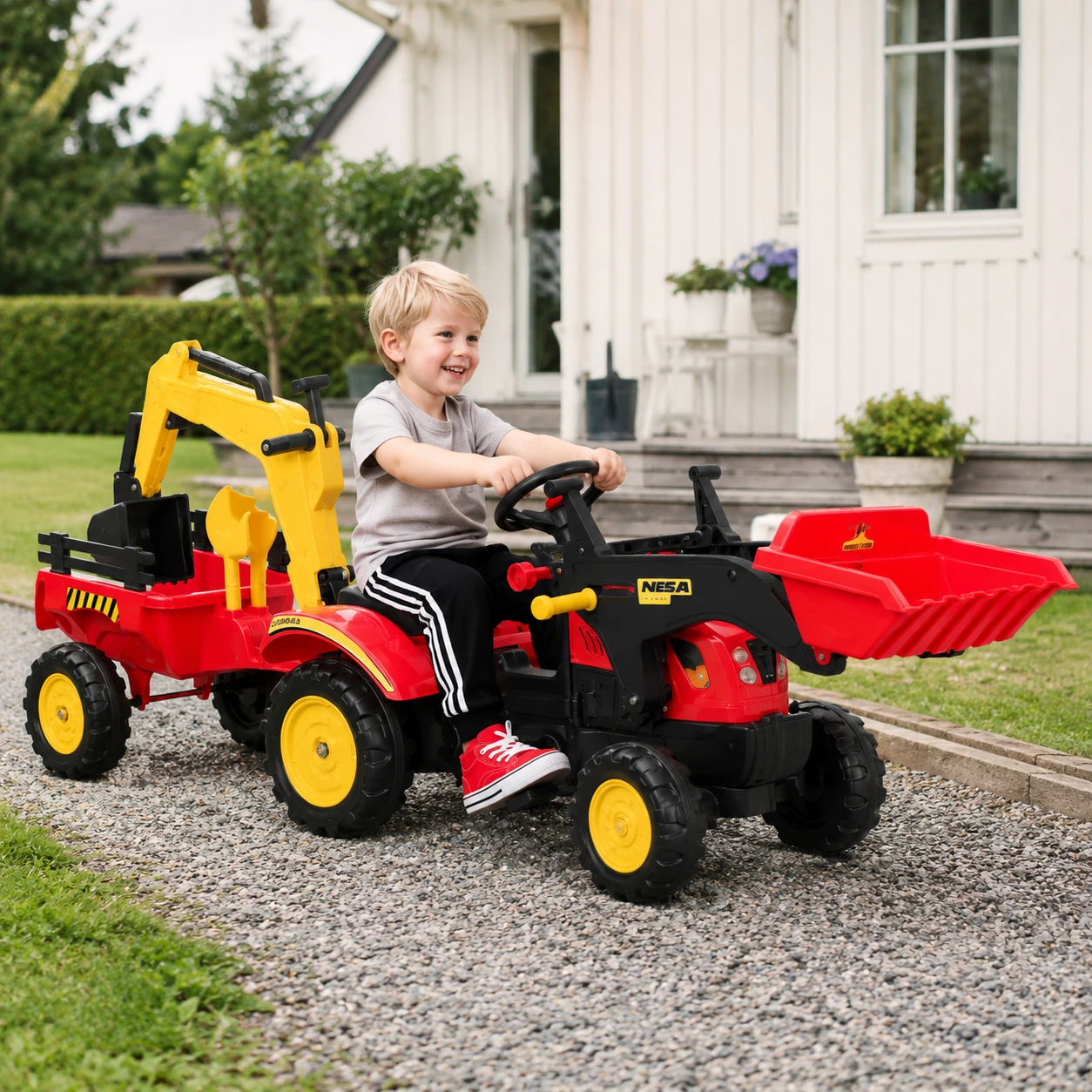 Pedaltraktor för barn med släp och skopa